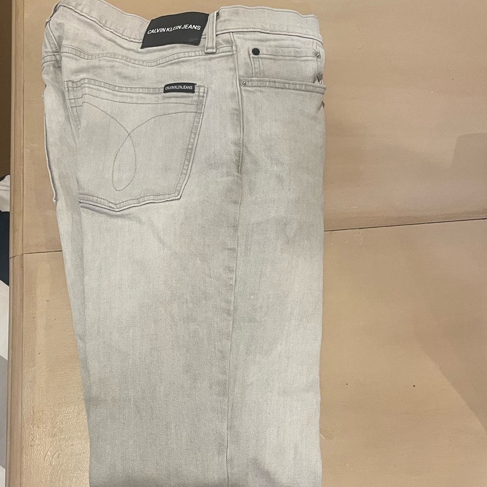 - Men's Calvin Klein gray jeans w33xL34